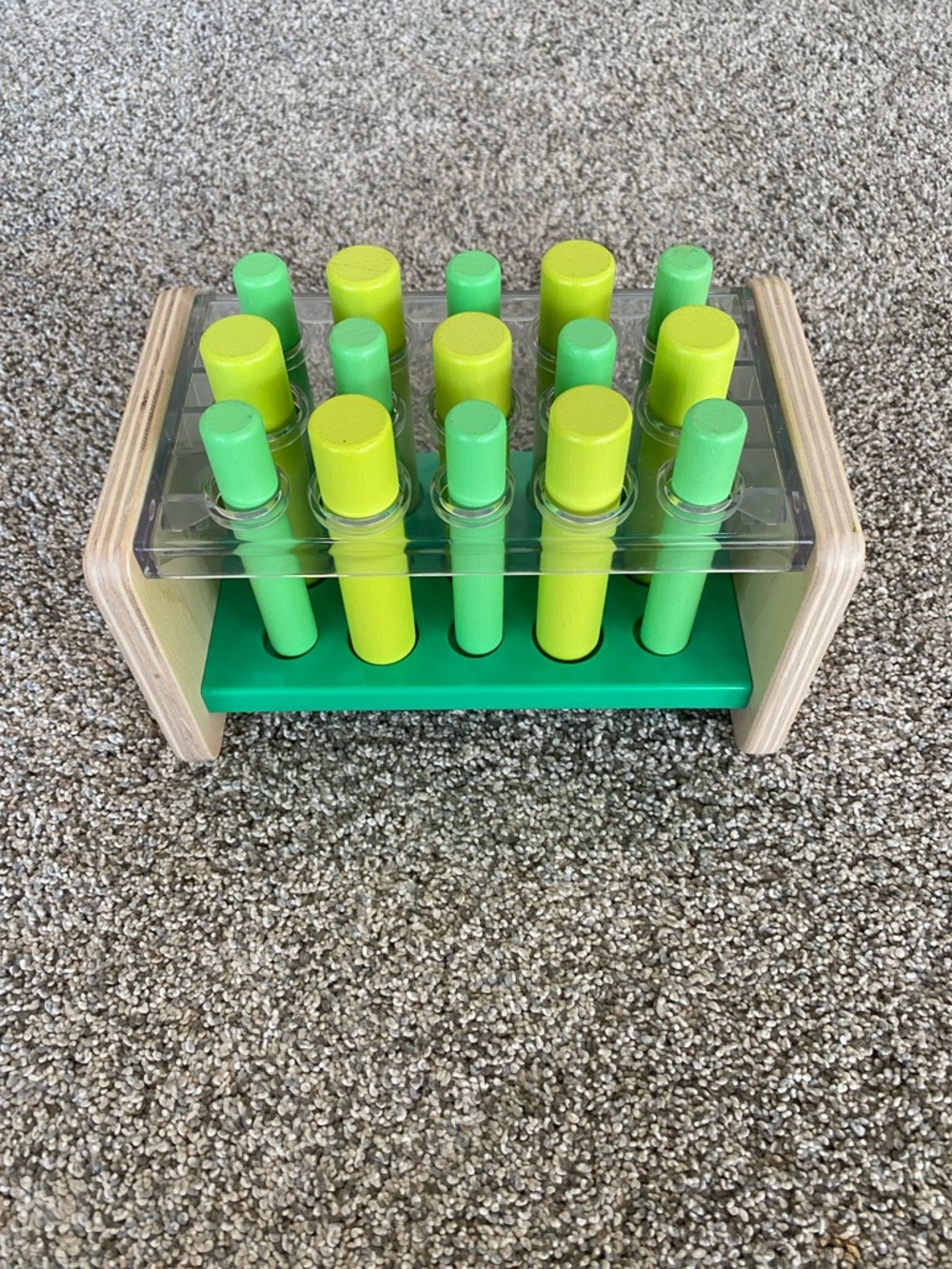 Lovevery Wooden Peg Toy with Green and Pegs